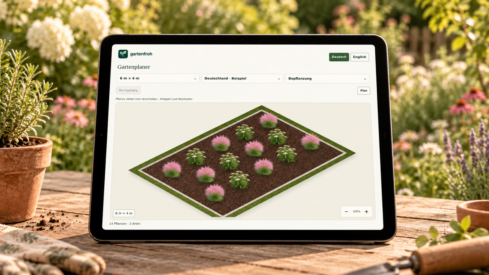 Gartenplaner auf einem iPad in einer Gartenszene